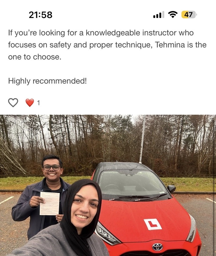 Syafiq Zainal Malek celebrating a driving test pass with Tehmina at Automatic Driving School Aberdeen
